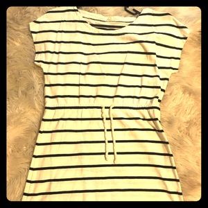 A JCREW dress. White with black stripe and a tie